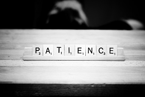 Broker advises peers to be patient