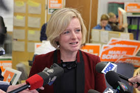Wage hike won’t cost jobs, claims Alberta Premier